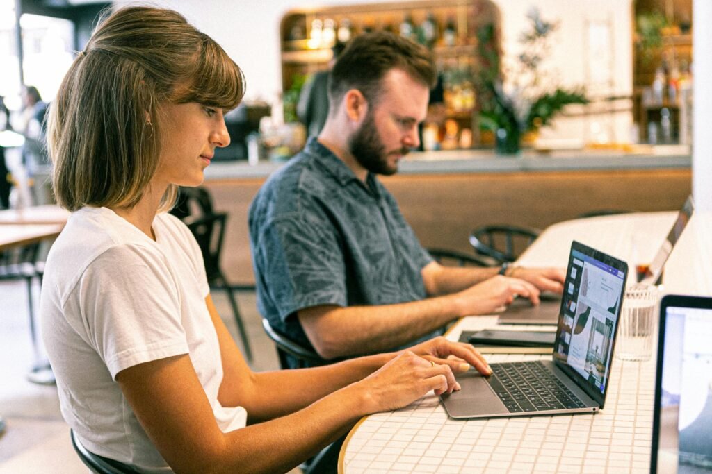 Office scene with people working on a digital marketing project.